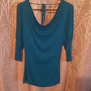 Woman's teal top drapped neck & back